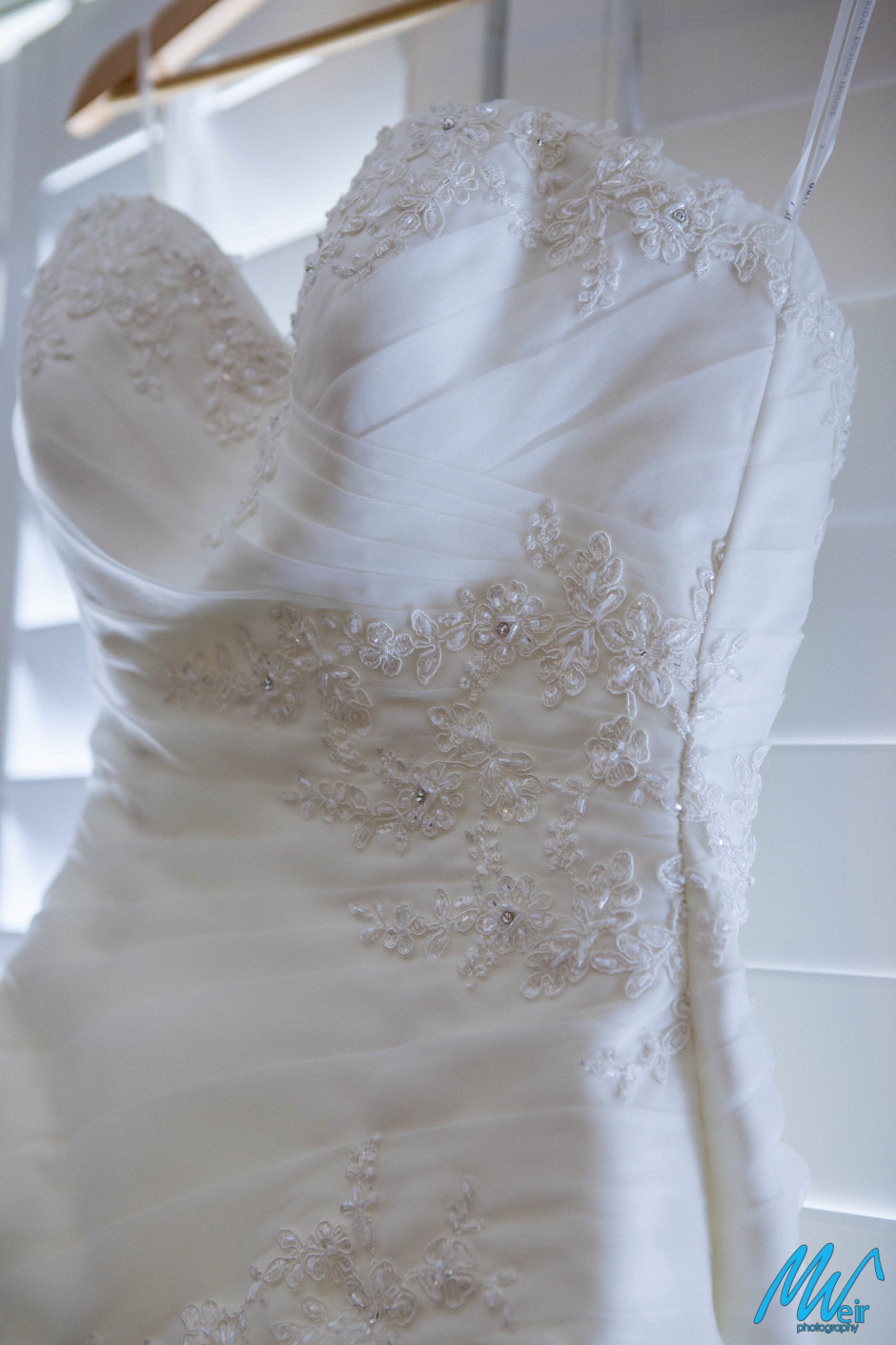 close up of brides wedding dress bodice