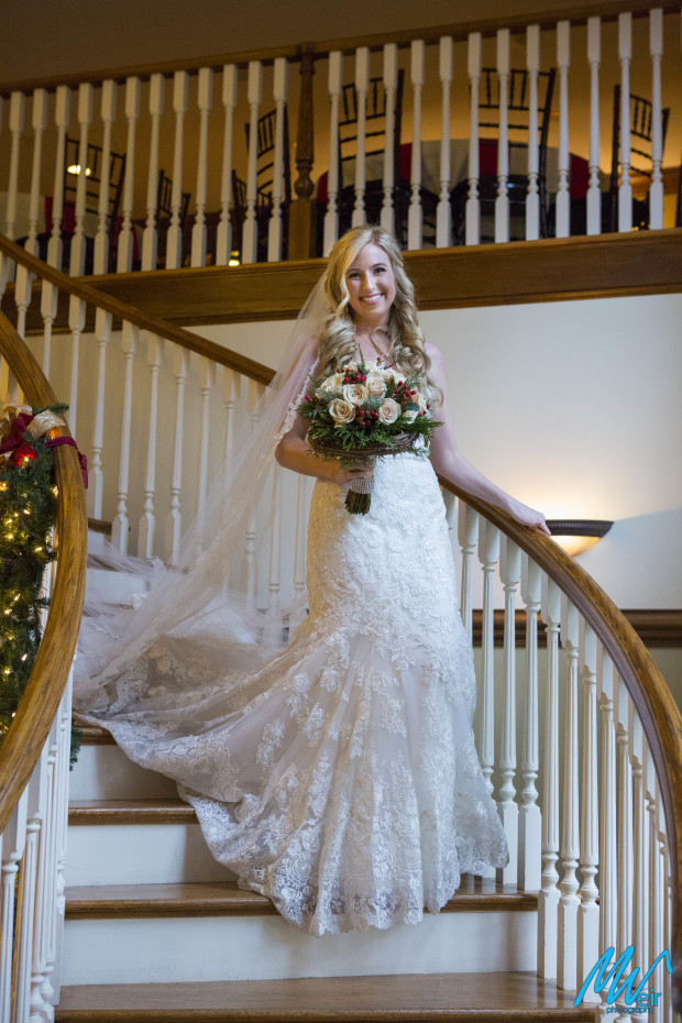 bride coming down the stairs during ceremony