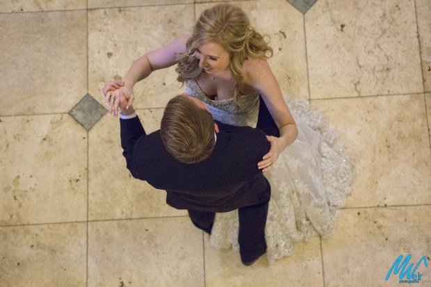downward shot of bride and groom during first dance
