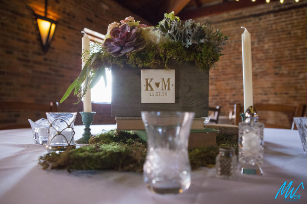 rustic table centerpiece with flower box and couples initials