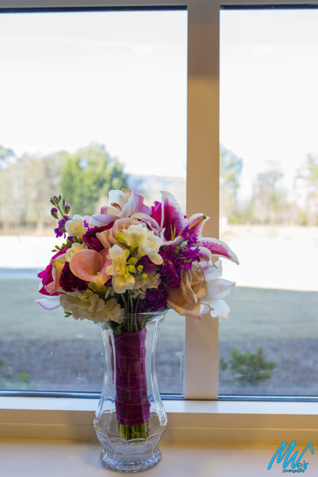 bridal bouquets with lilies, roses, and calla lilies