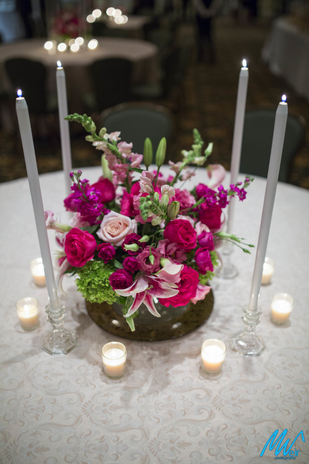 low table centerpiece with lilies and roses