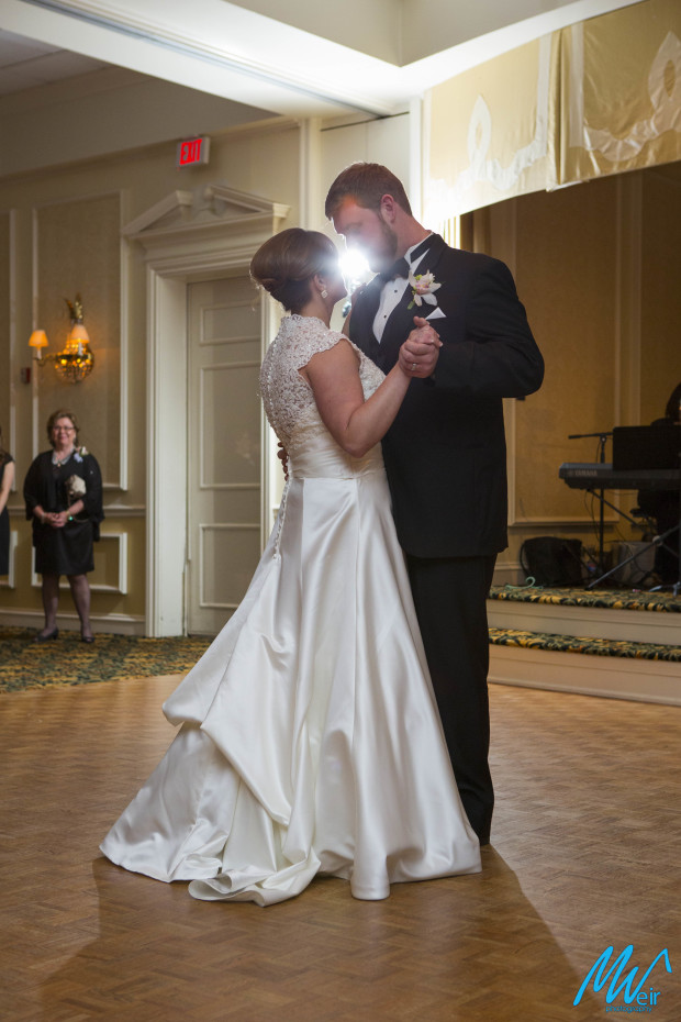 bride and groom dance their first dance as husband and wife
