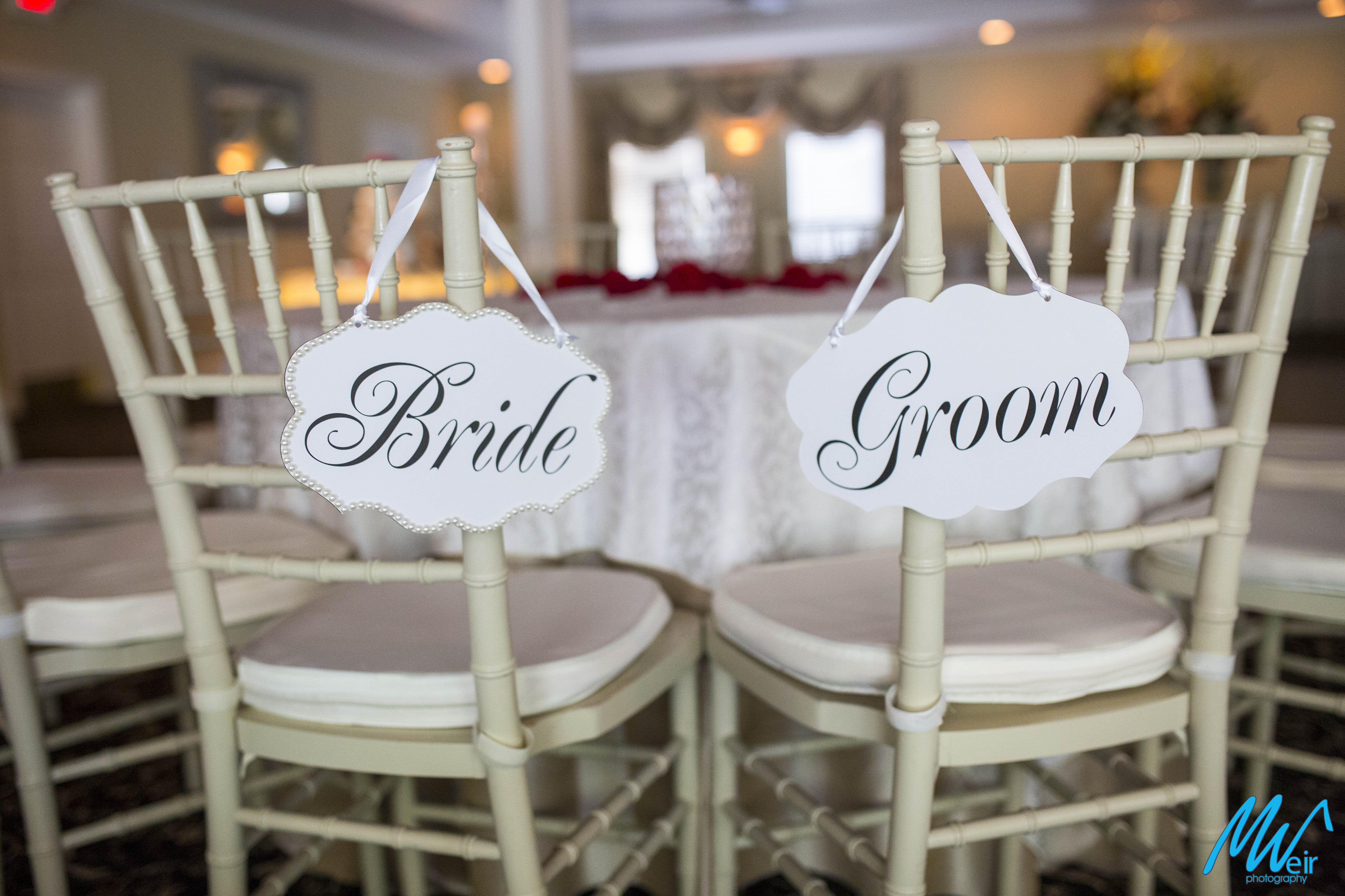 bride and groom chairs