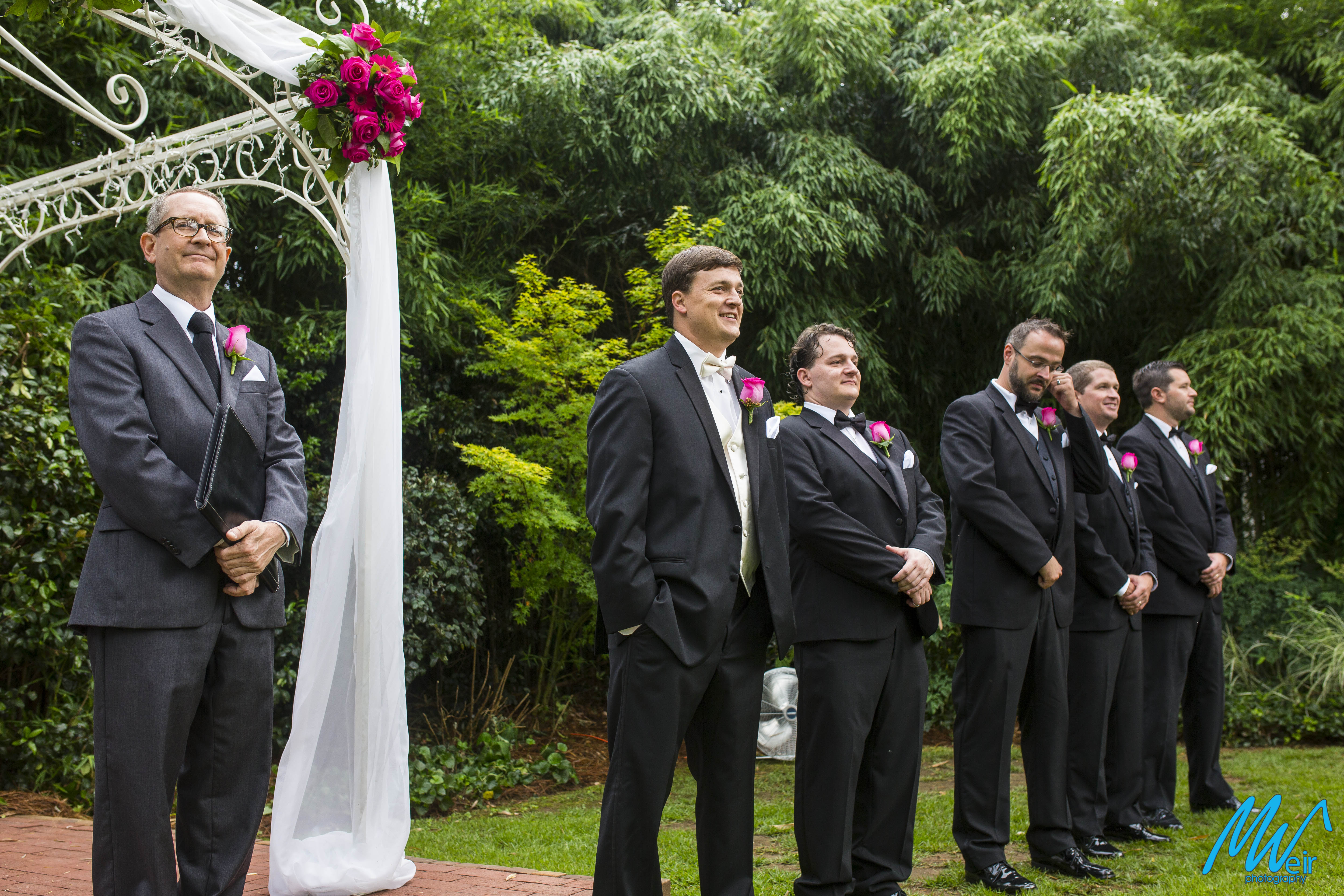 groom waiting for bride to walk down aisle