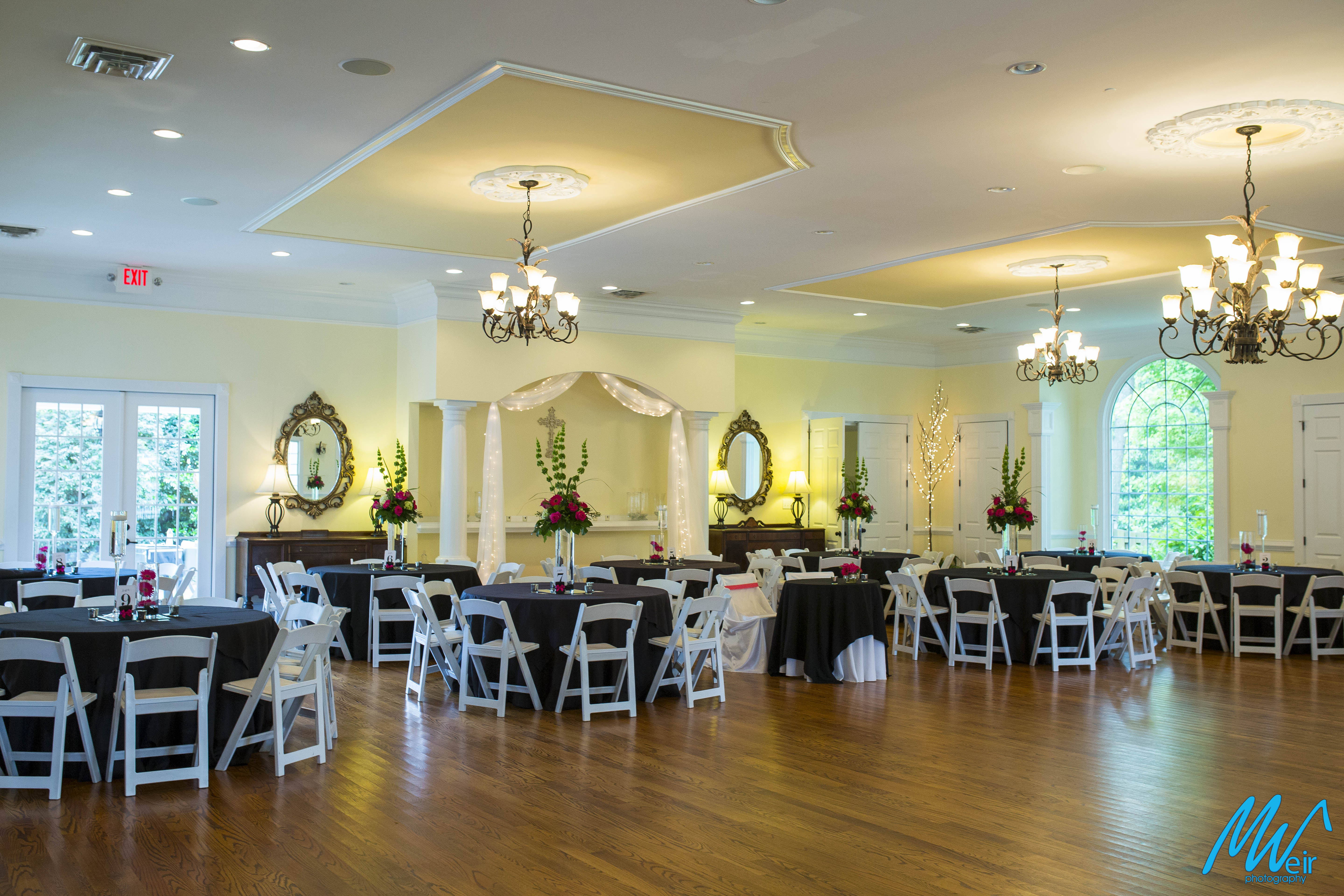 ballroom decorations with tall flowers