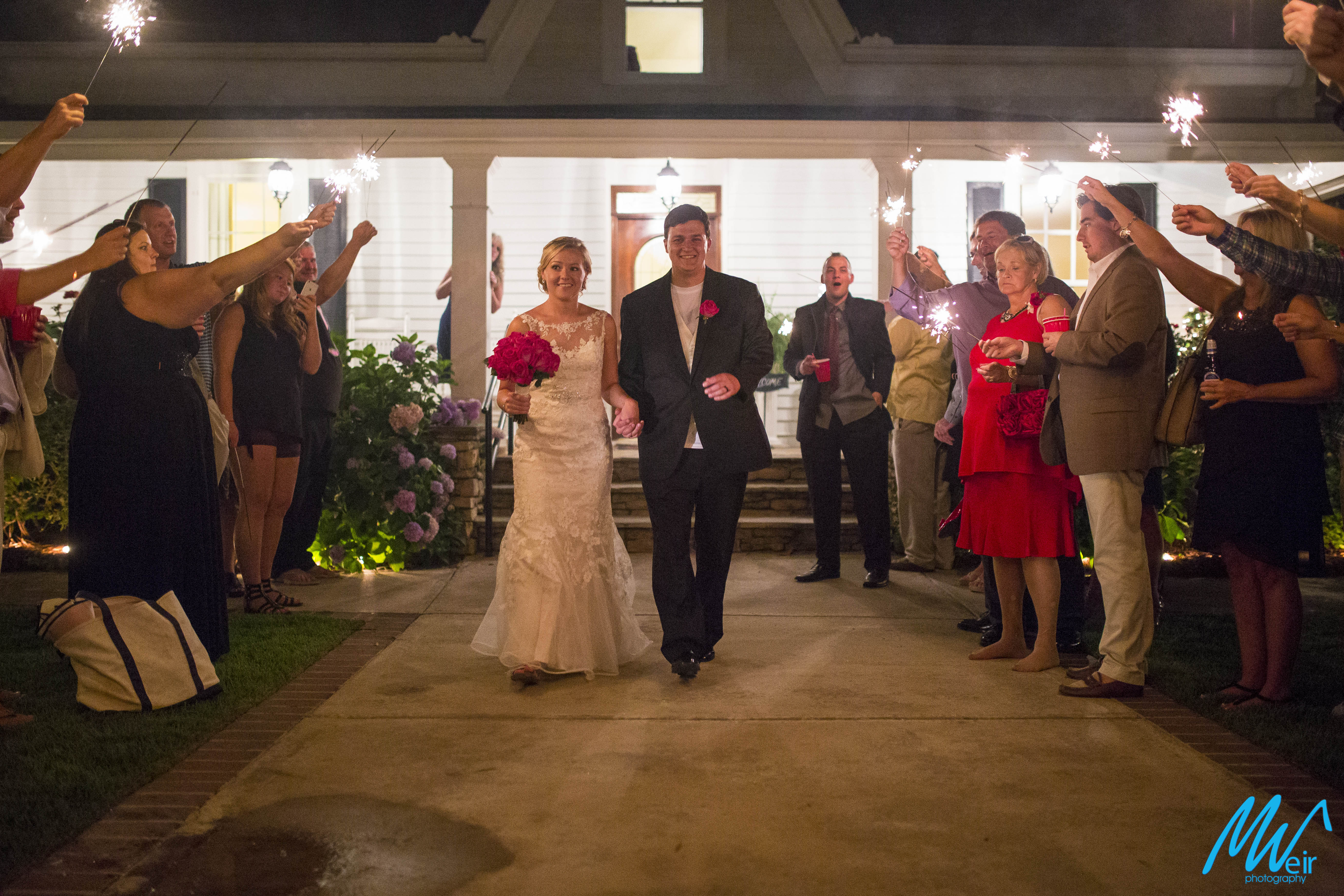 bride and groom make a grand sparkler exit