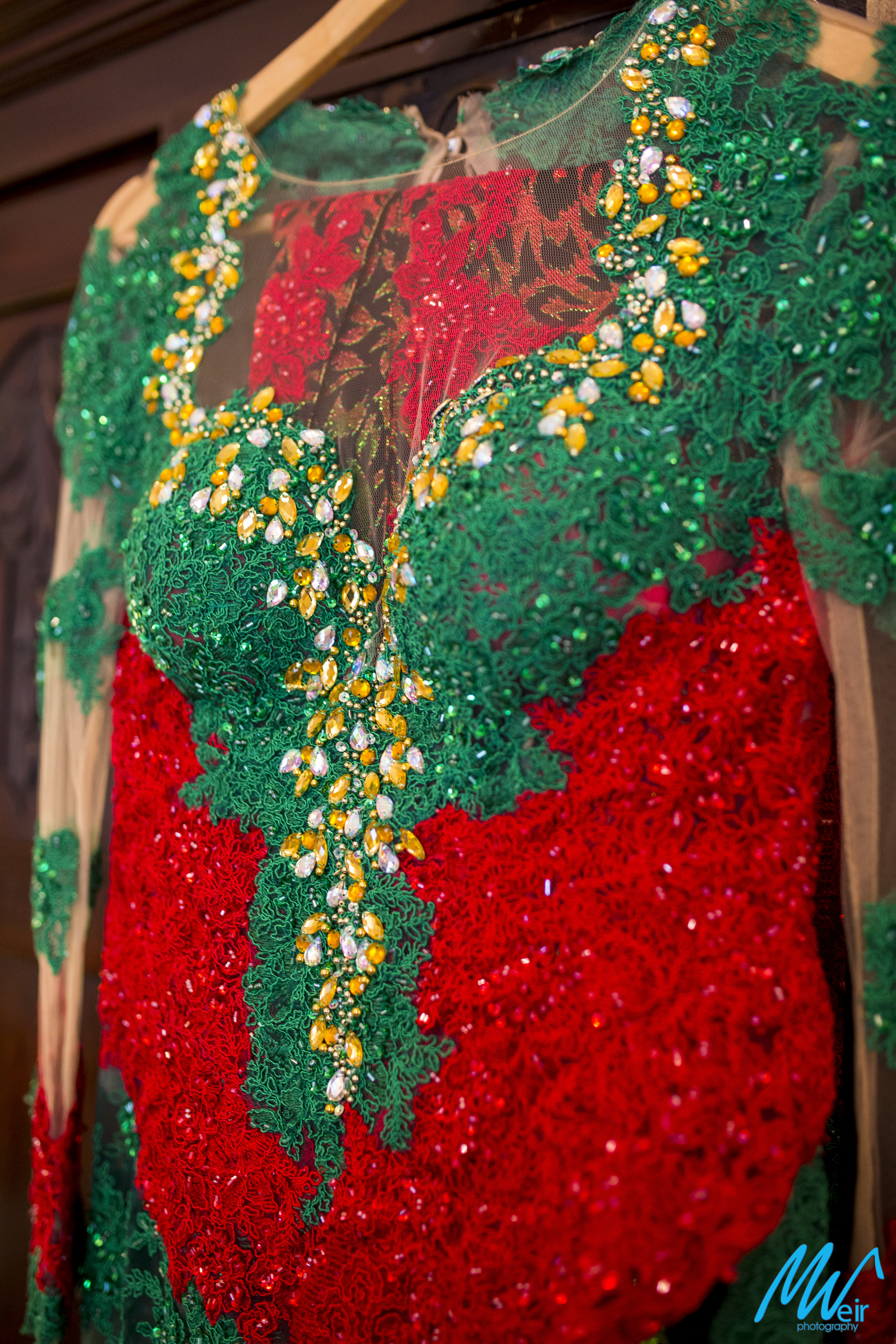 Red & green wedding reception dress for the bride