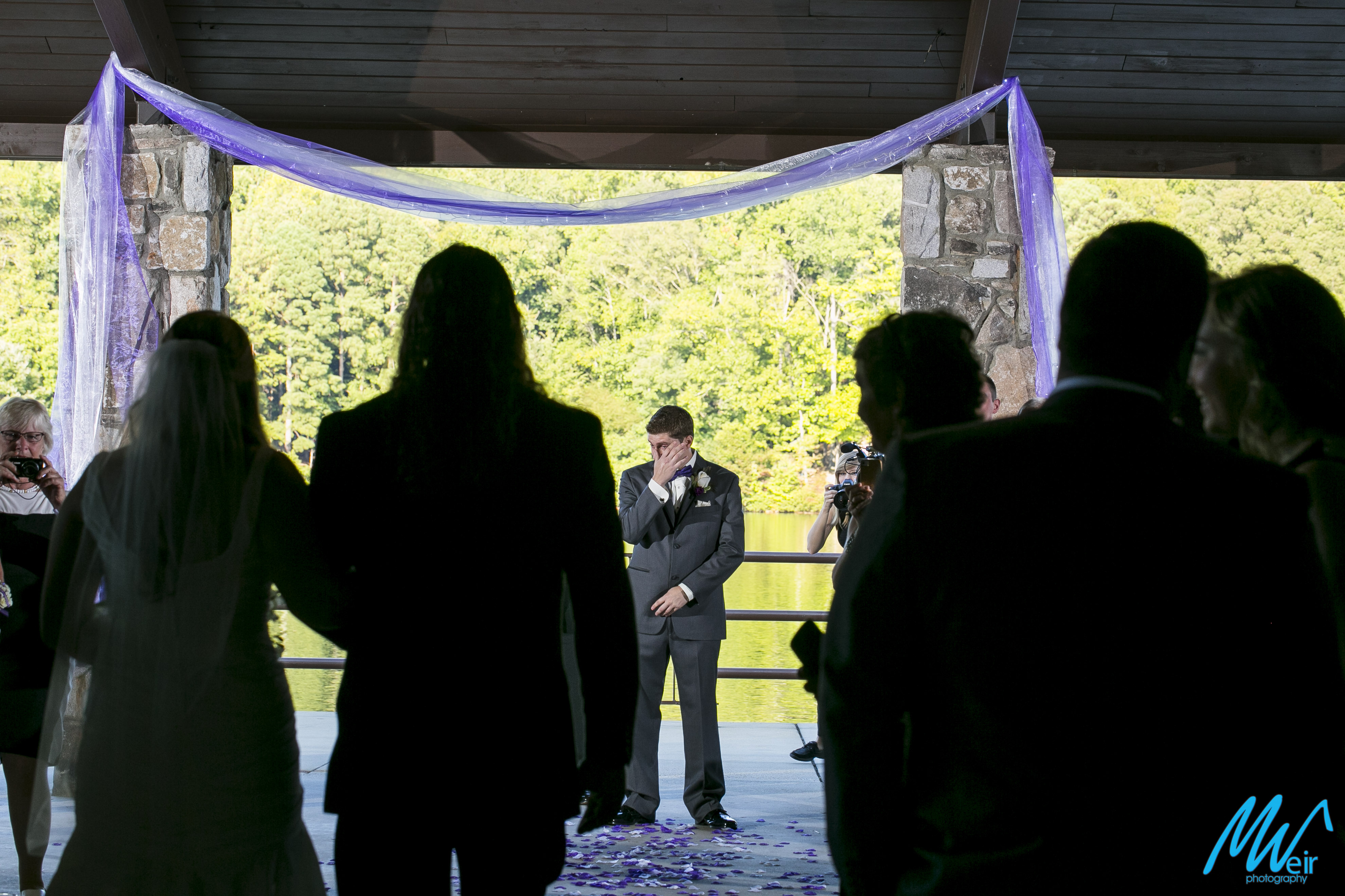 groom cries when his bride walks down the aisle