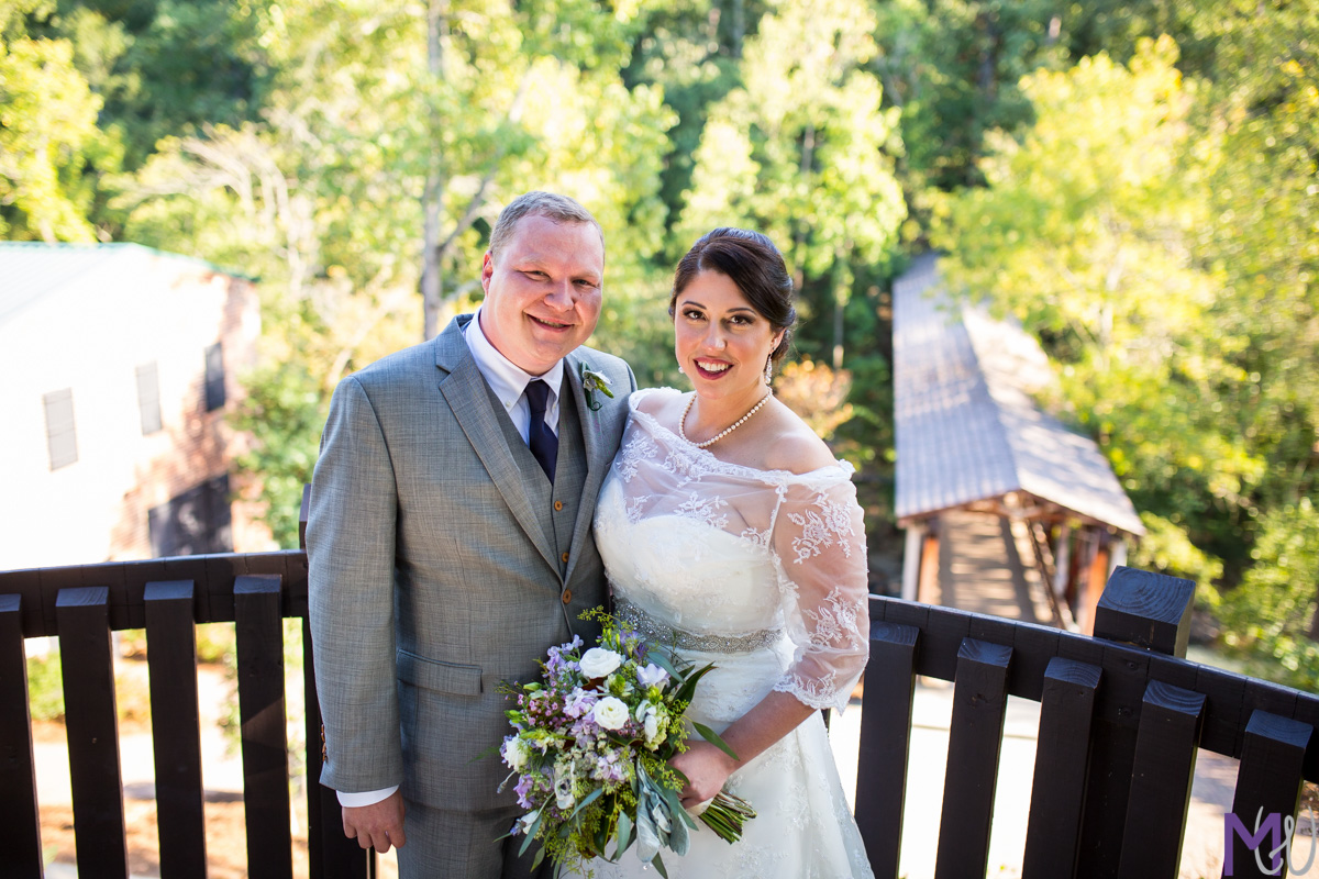 bride and groom at roswell mill
