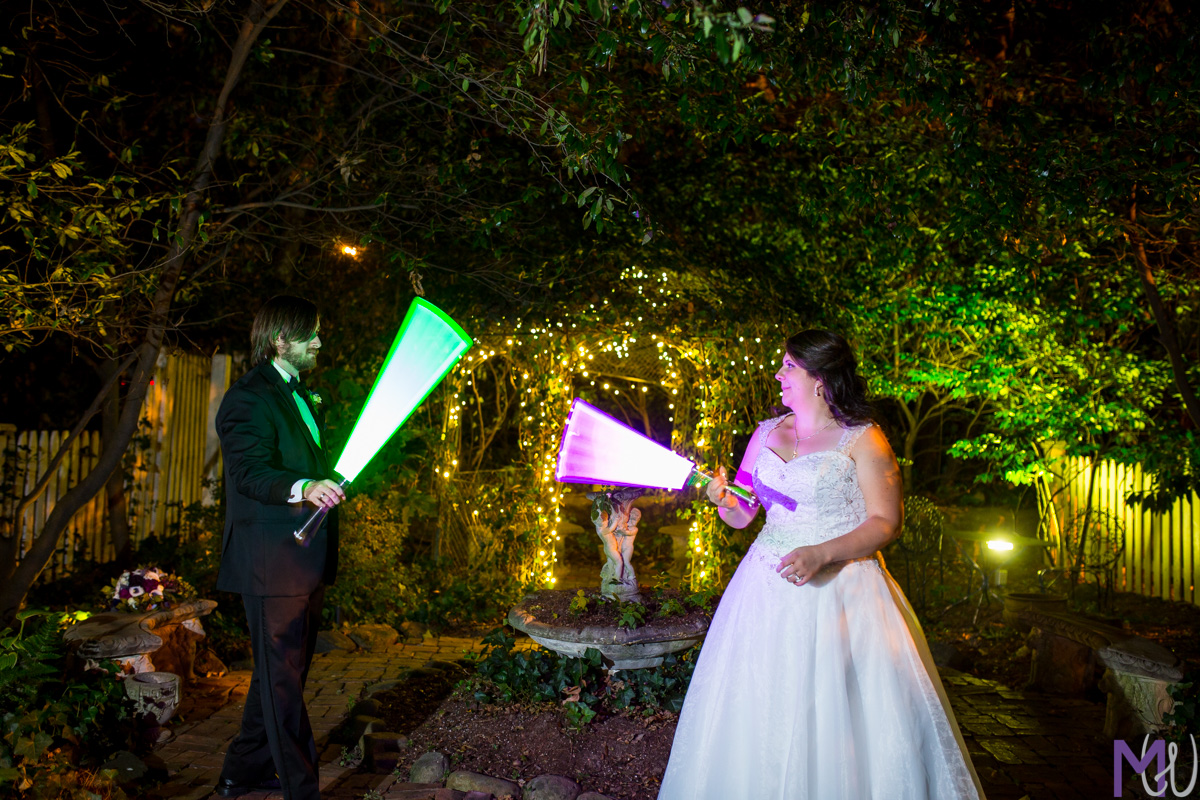 bride and groom battle light sabers