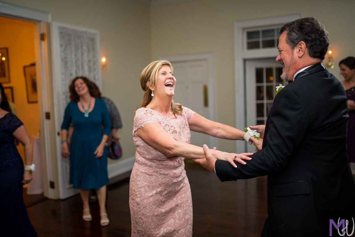 mother of the bride dances at wedding reception