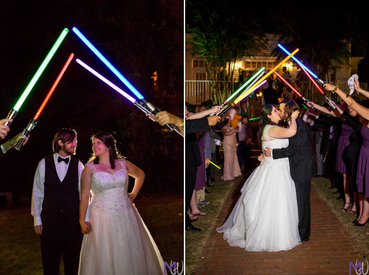 newlywed grand exit with light sabers