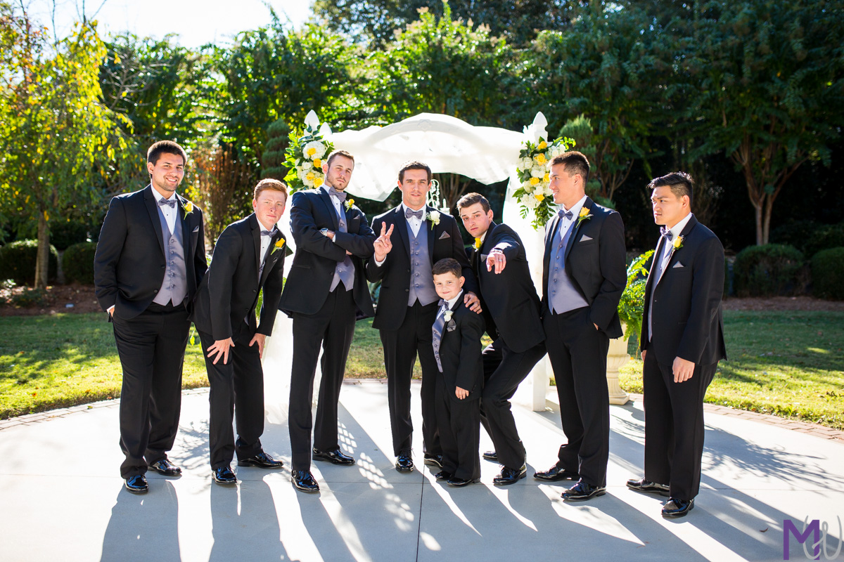 groomsmen strike a pose