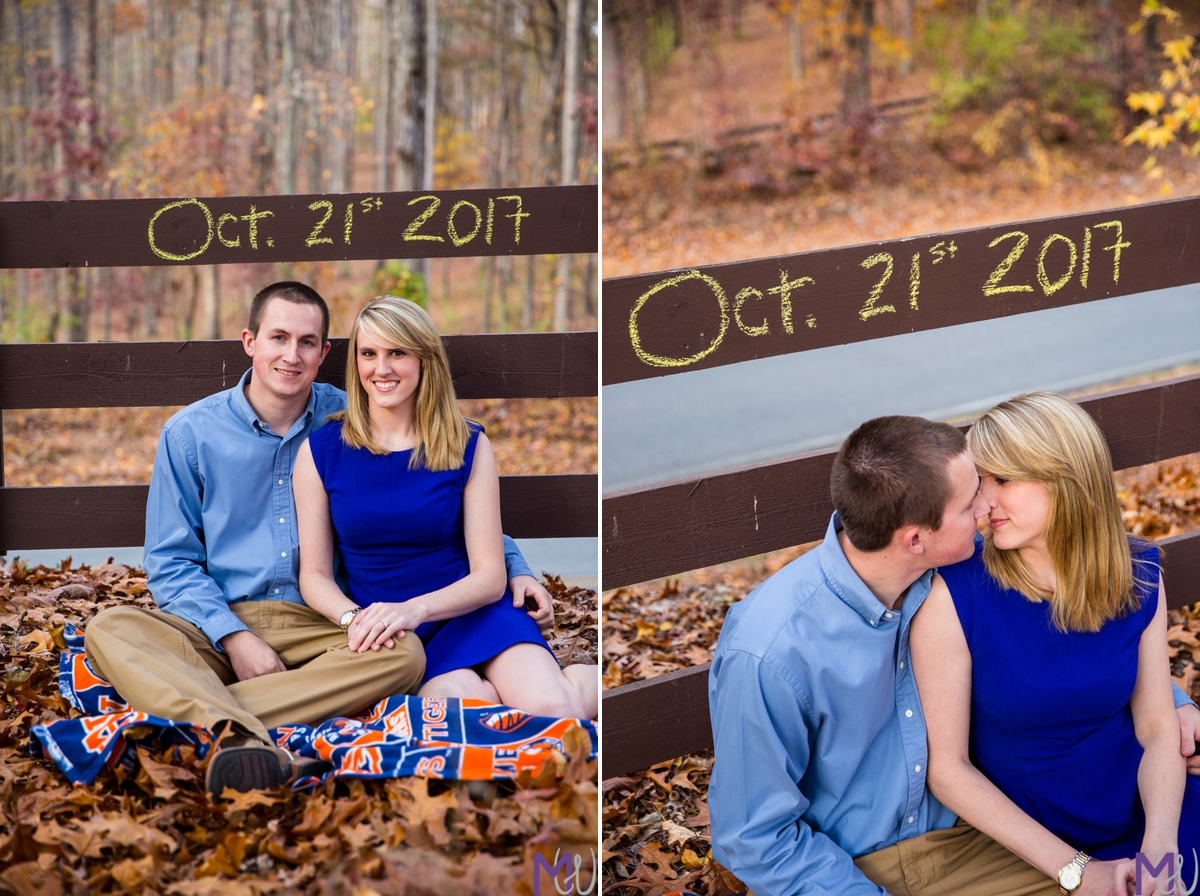 engagement photos in a family owned vineyard in palmetto with fall leaves and save the date written on wooden fence