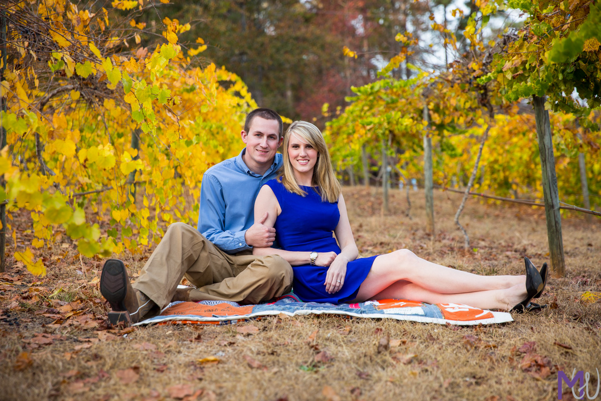 engagement photos in a family owned vineyard in palmetto with fall leaves