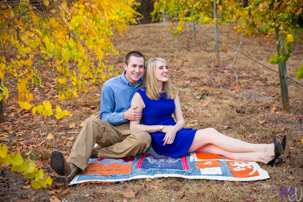 engagement photos in a family owned vineyard in palmetto with fall leaves