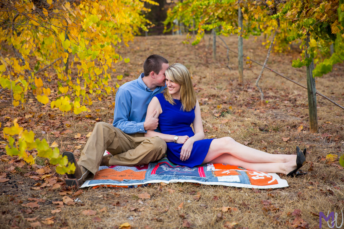 engagement photos in a family owned vineyard in palmetto with fall leaves
