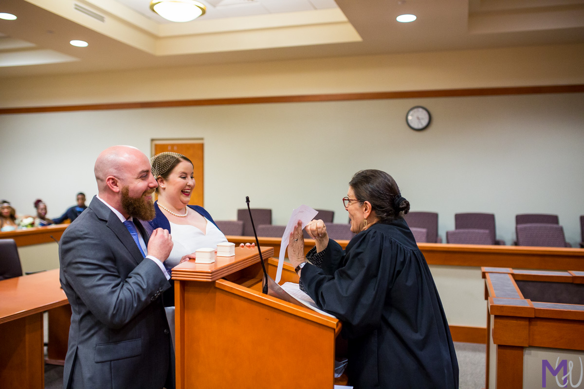 bride and groom get married in the decatur courthouse