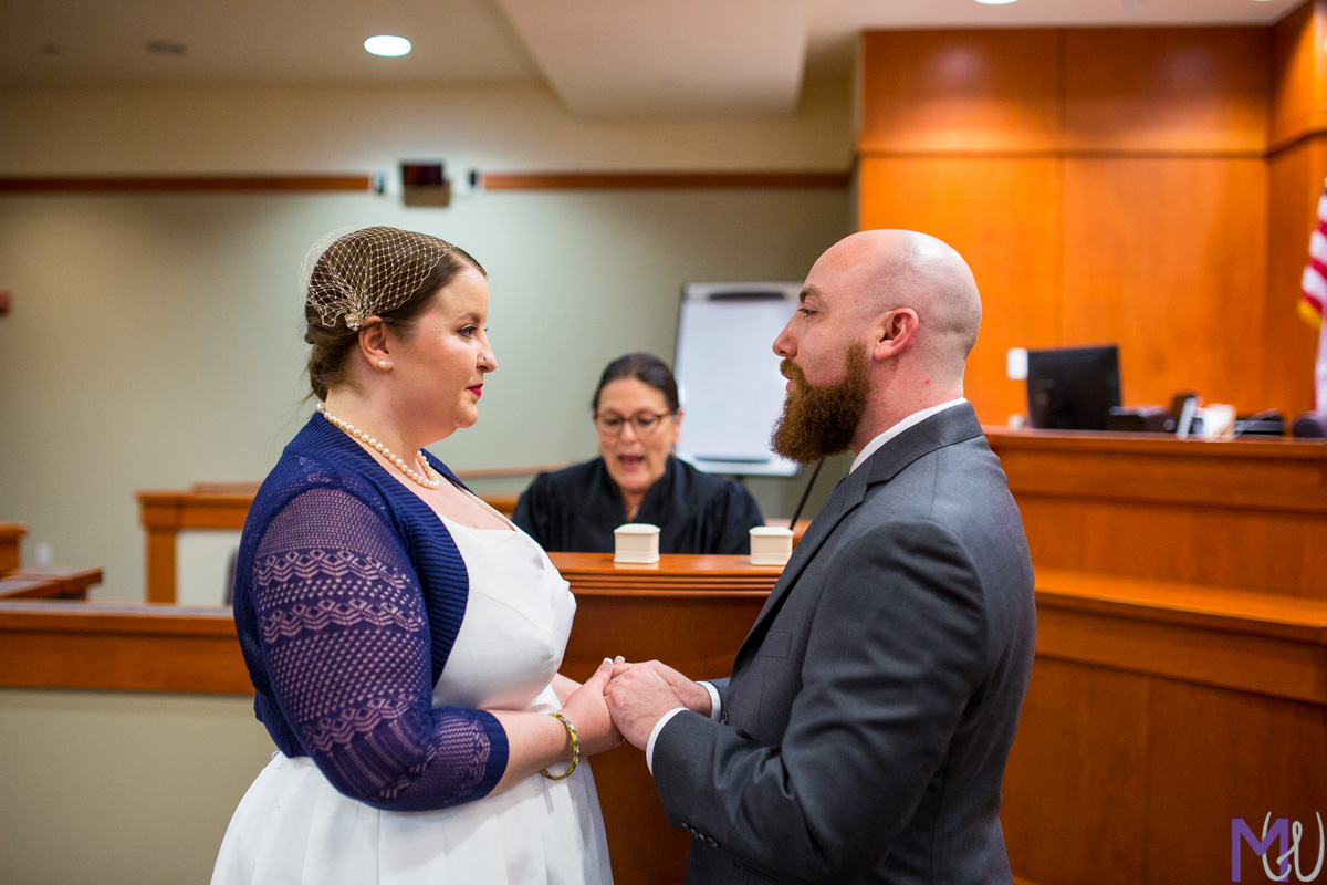 bride and groom get married in the decatur courthouse