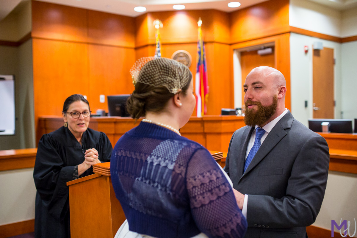 bride and groom get married in the decatur courthouse