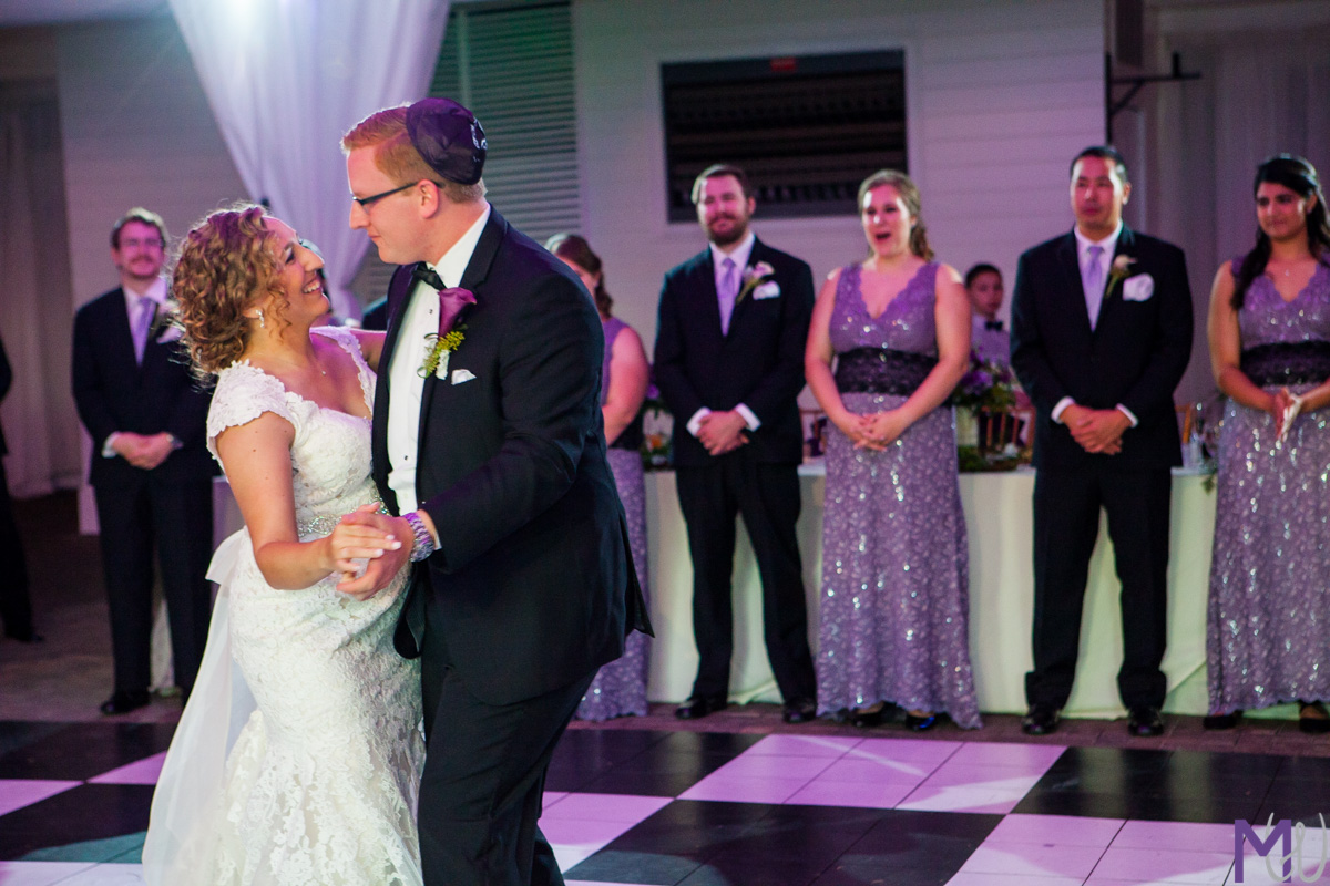 bride and groom share a first dance