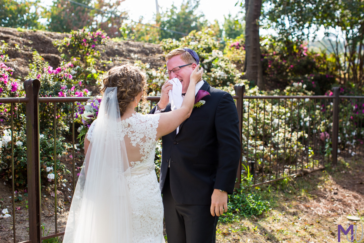 groom cries during first look