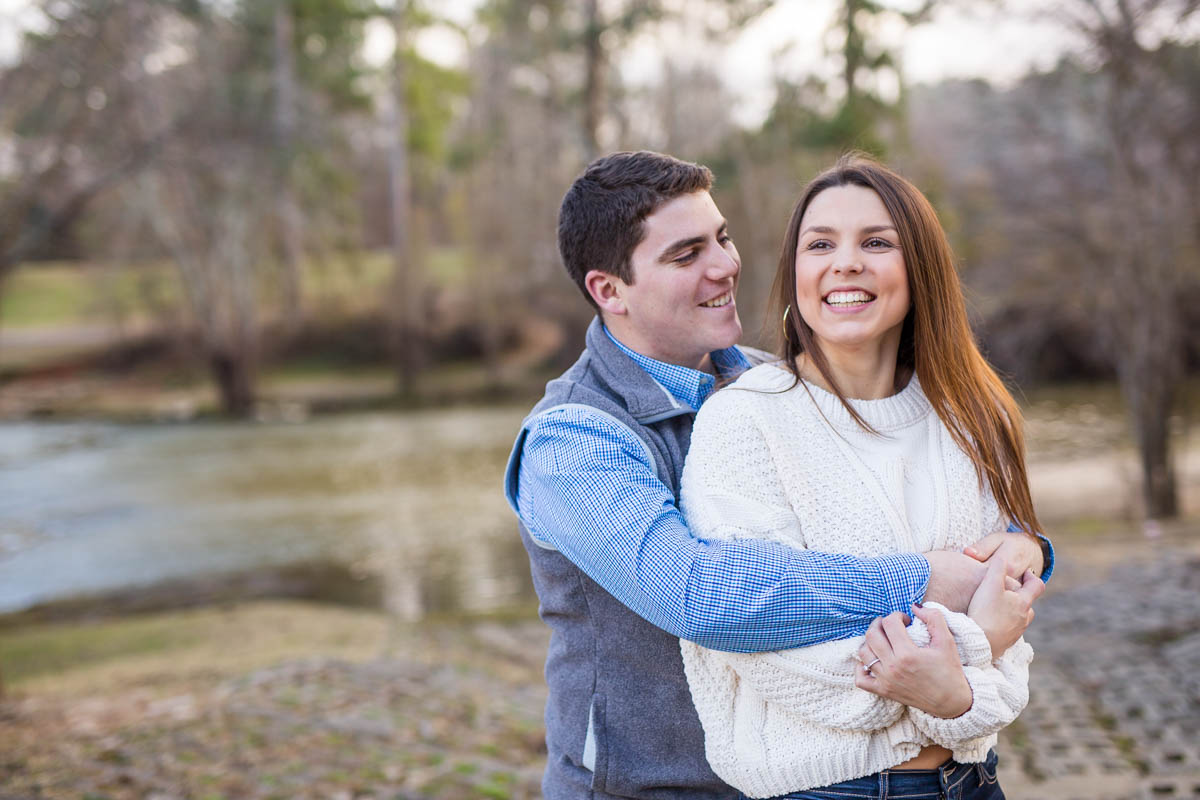 bride and groom engagement photos at Starrs Mill Red Barn in Fayetteville Georgia