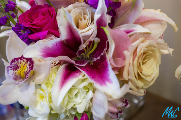 bridal bouquets with stargazer lilies, roses, and calla lilies