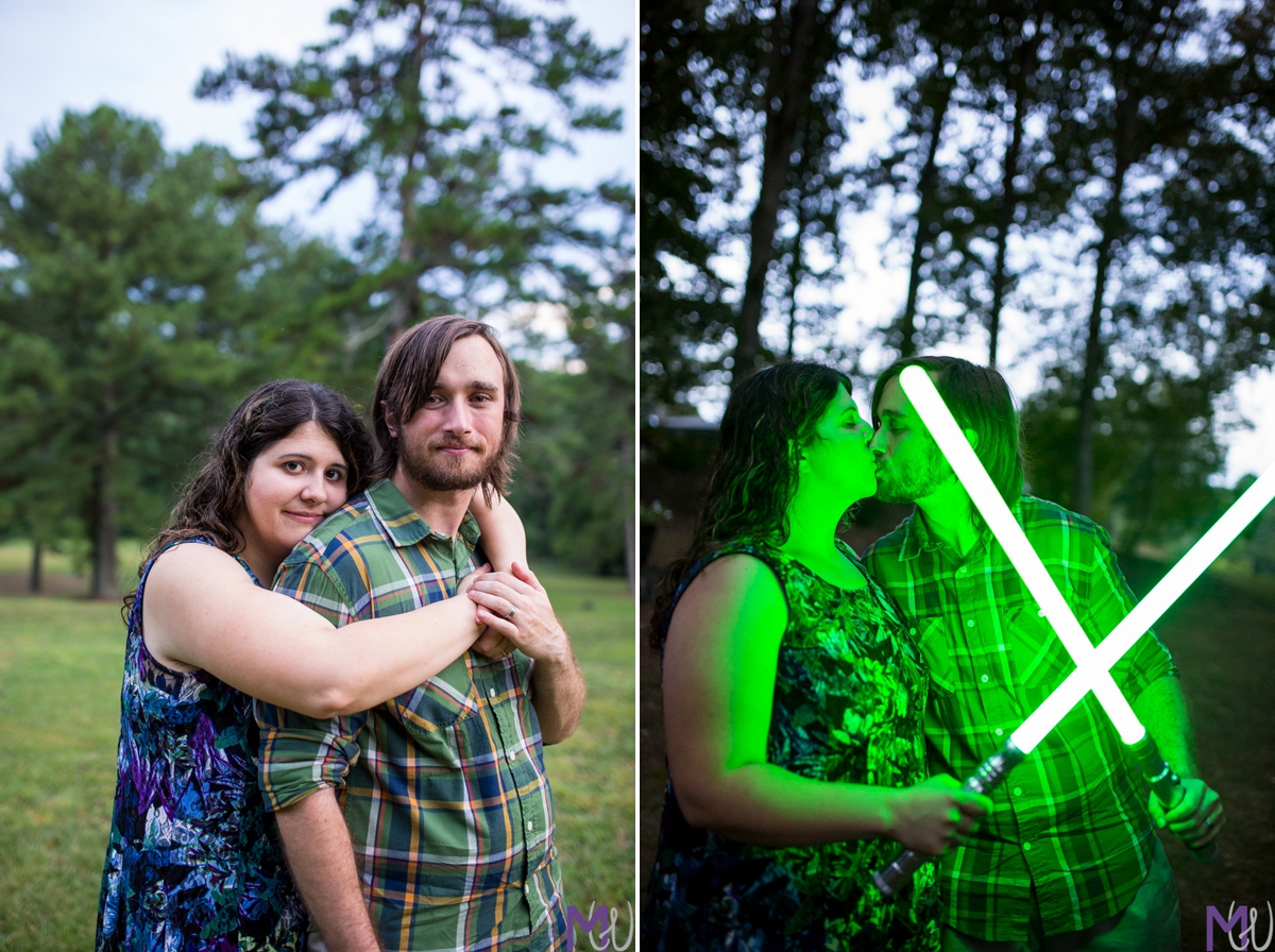 nerd couple engagement shoot in woods, waterfall, bridge, and field with lightsabers